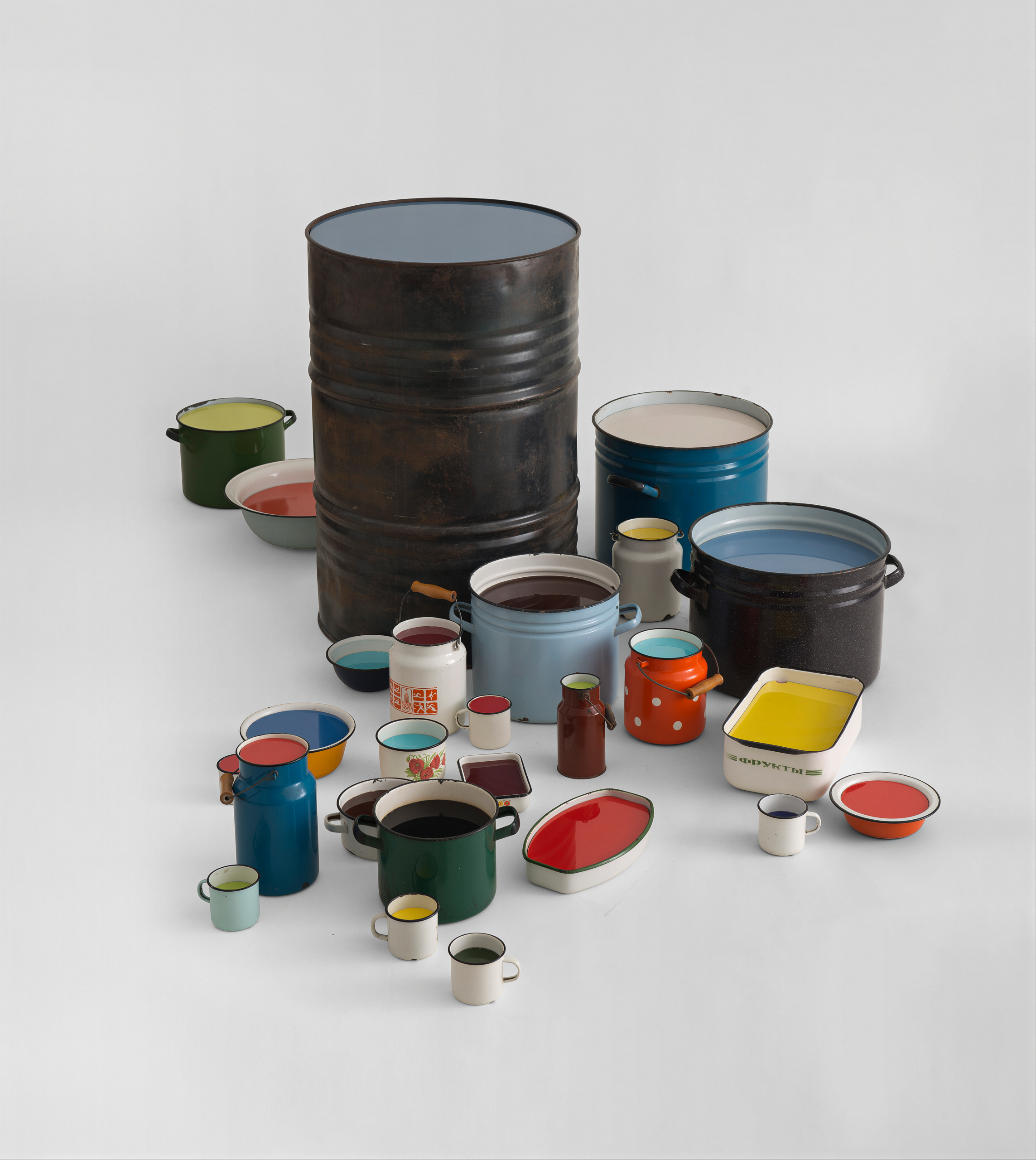 Zhanna Kadyrova. From the Abstract Fill series. 2012. Enamel dishware, metal canister, ceramic tile. Variable sizes